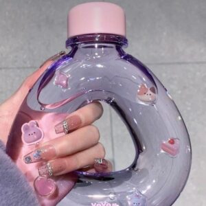 Trendy Portable Sling Water Bottle - Unique Doughnut/Pear Shaped BPA-Free Plastic Bottle with Adjustable Carrying Strap (Purple)