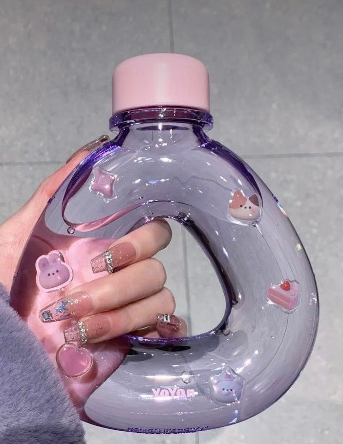 Trendy Portable Sling Water Bottle - Unique Doughnut/Pear Shaped BPA-Free Plastic Bottle with Adjustable Carrying Strap (Purple)